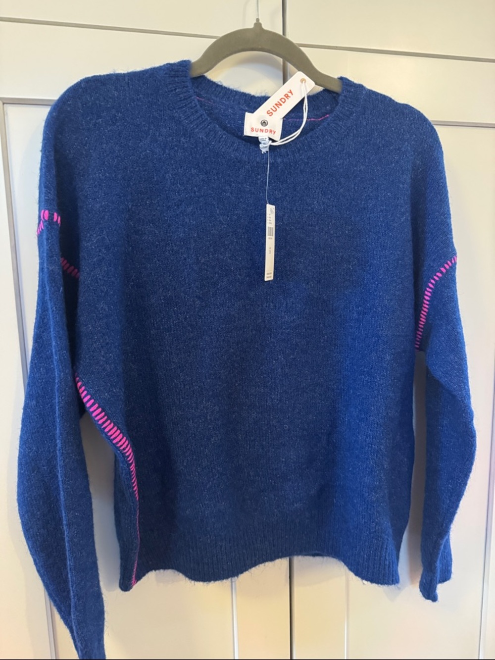 Sundry Deep Blue Crewneck Baseball Sweater with Pink Stitch Detail